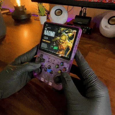 A handheld console browsing retro system menus and playing a game